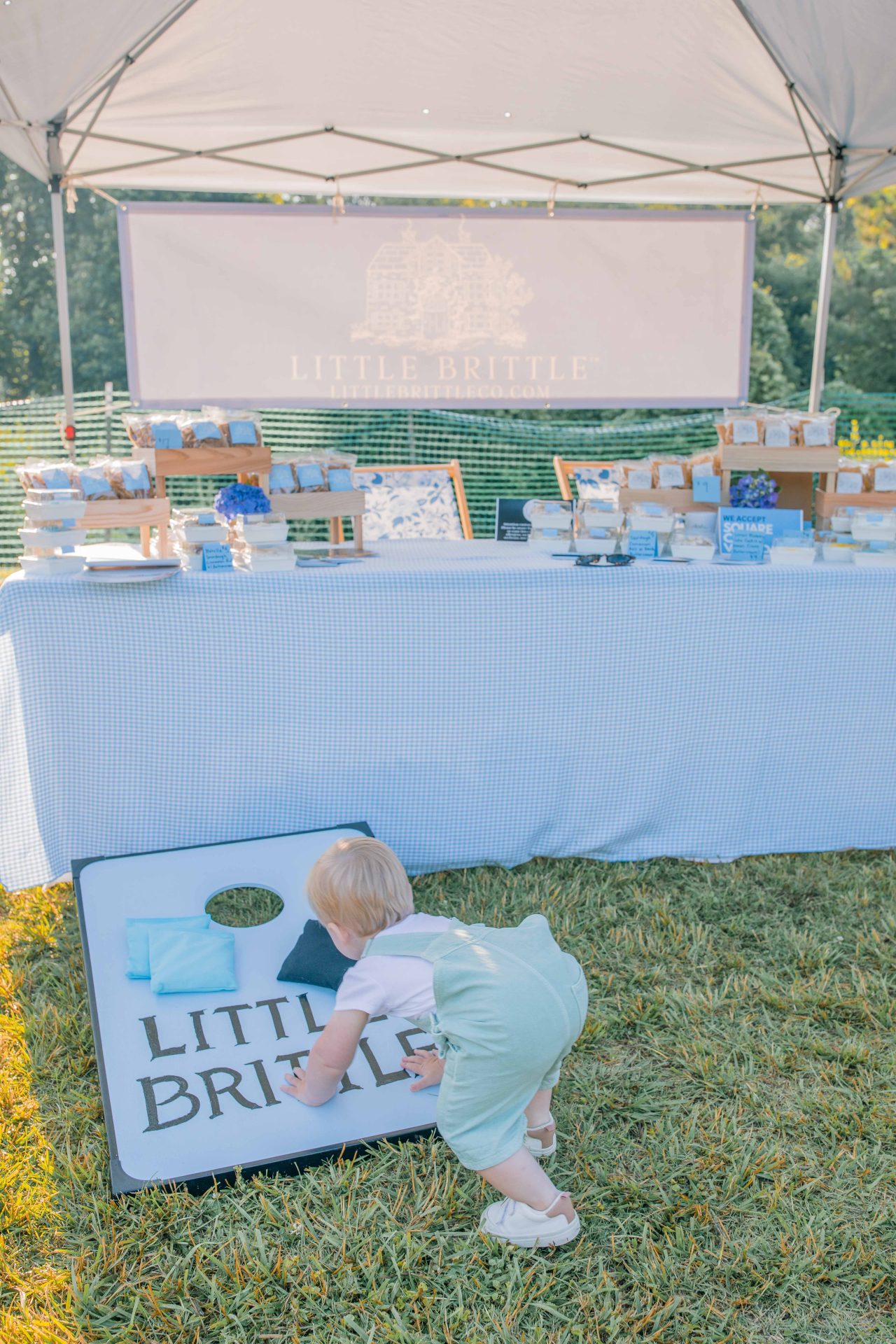 starting a business, little brittle llc, little brittle peanut brittle, little brittle, taralynn, owner of little brittle, moms starting businesses, how to start a business, my first farmers market, farmers market fort mill South Carolina, working, bakery, peanut brittle company, brittle company, the best brittle ever, maple cinnamon pecan brittle, marketing, business branding, cottage, business aesthetic, South Carolina business, South Carolina farmers market, town of fort mill, fort mill south Carolina, sourdough cinnamon rolls, commercial kitchen, best brittle in South Carolina, starting a business as a mom 